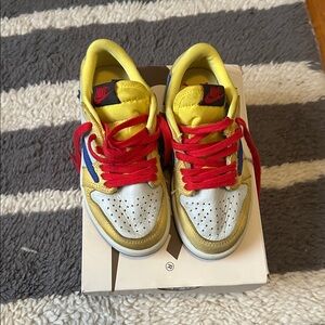 Travis Scott x air Jordan 1 retro low OG canary.